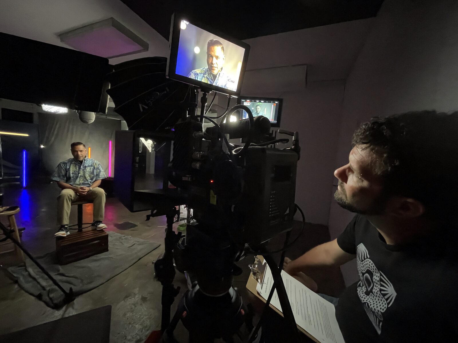 Tony Azios at the monitor during a studio interview shoot